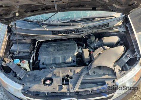 2012 Honda Odyssey Touring z USA, uszkodzony, nr VIN 5FNRL5H95CB115780